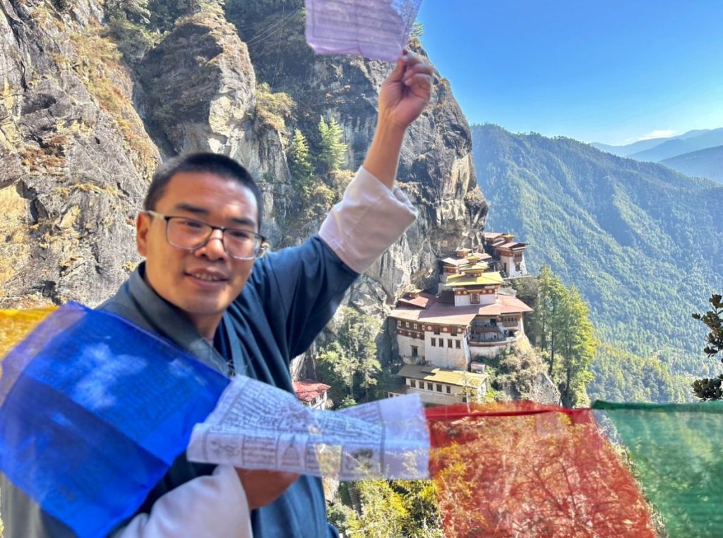 Tenzin Image with Taktsang View